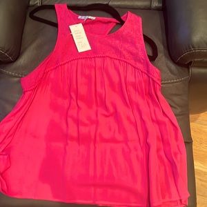 Brand new. A Joy Joy tank top. Great for casual wear